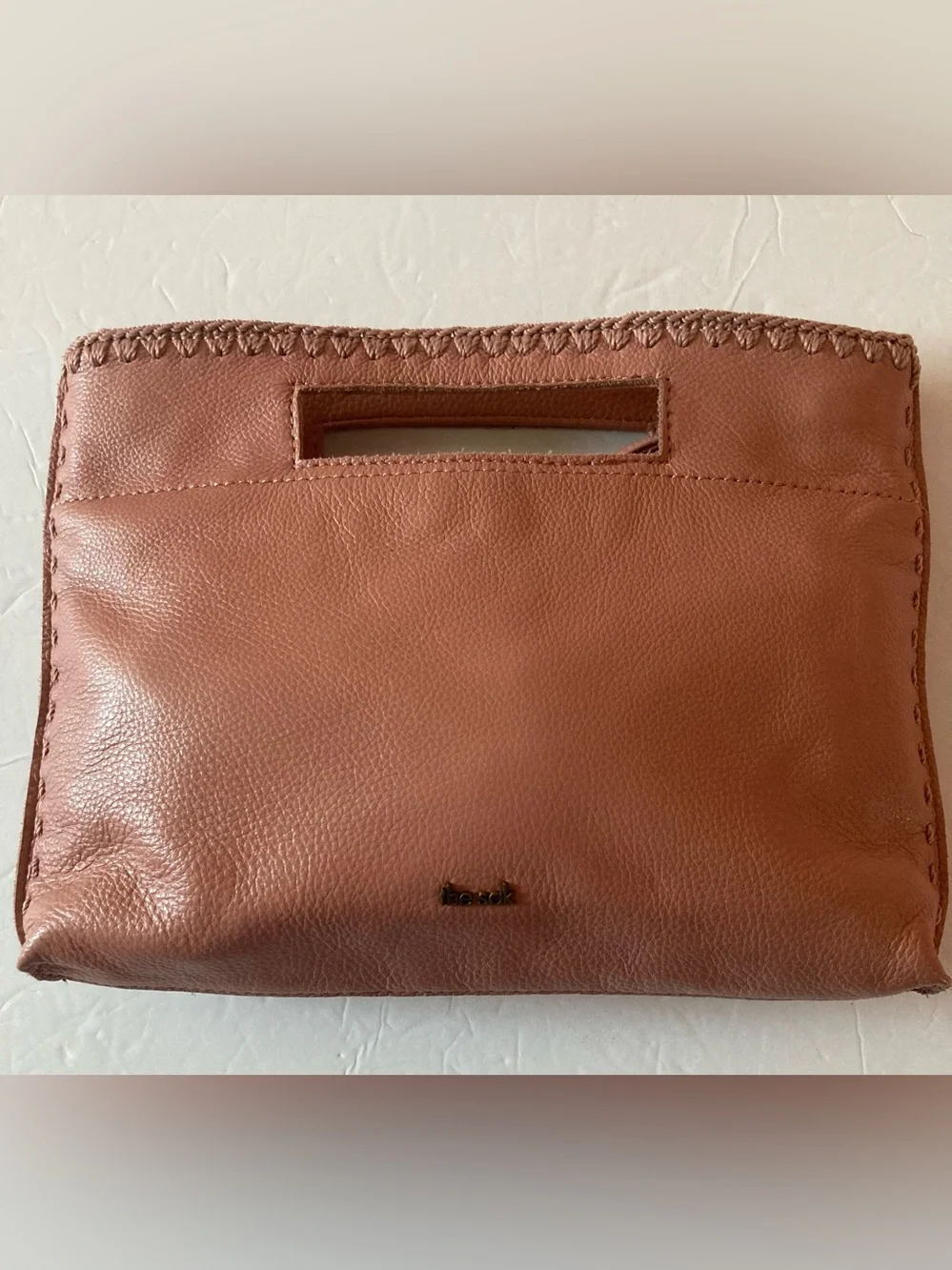The Sak coral lite pink Leather Cutout-Handle Crossbody Clutch Hand Stitched